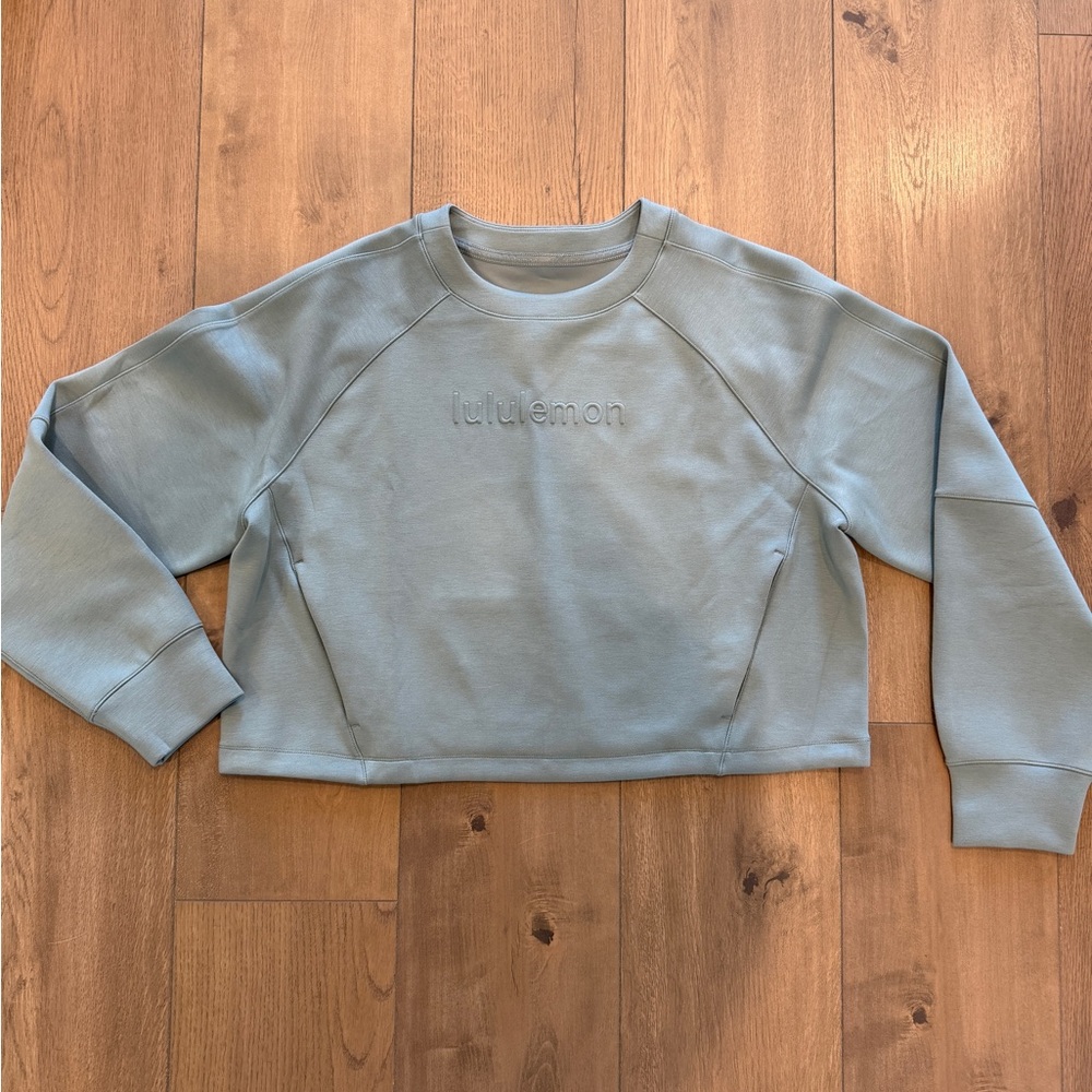 Smooth Spacer Cropped Pullover in Crater Blue. Size 10